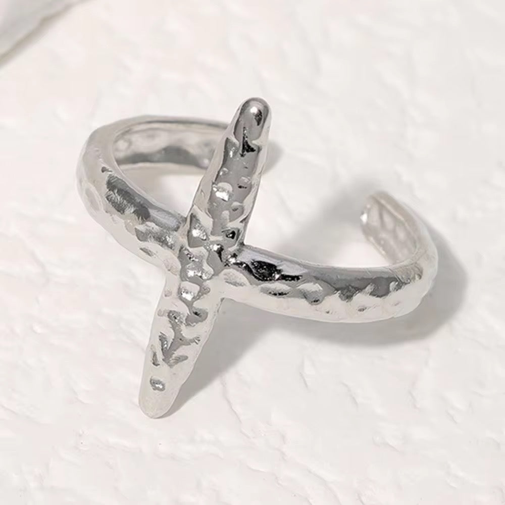 X crossed stainless steel adjustable ring