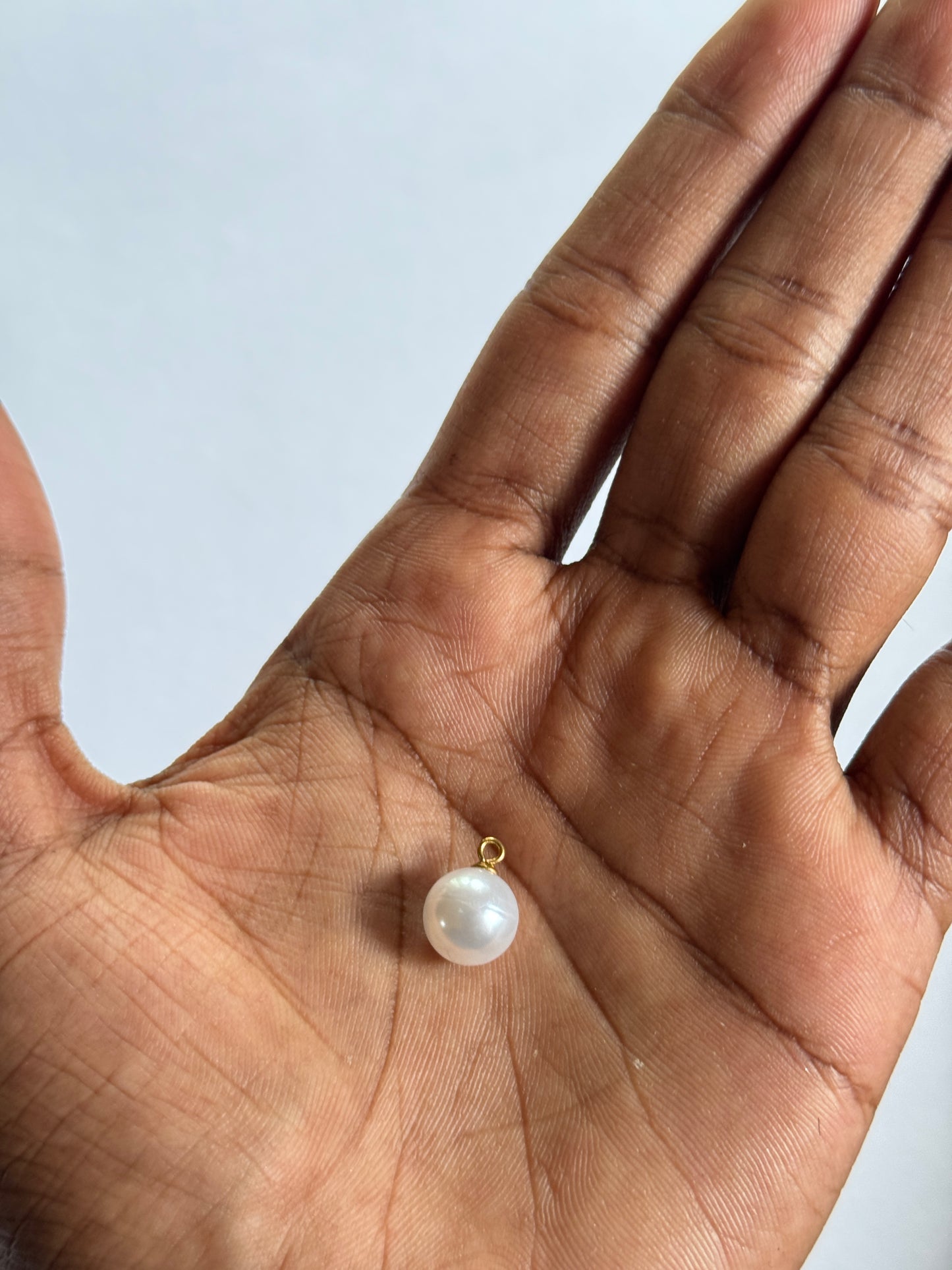 white bead pendant with hook