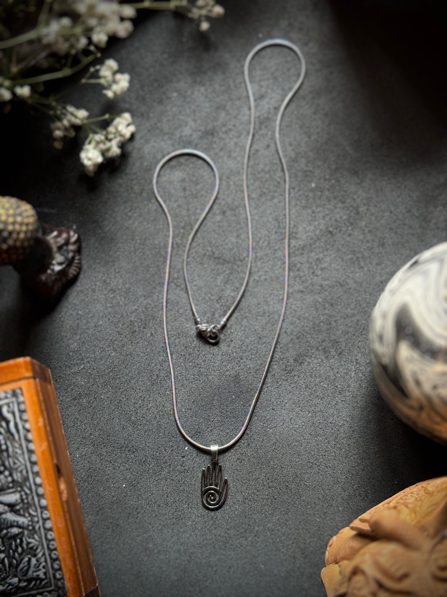 Spiral hamsa hand silver stainless steel necklace in 55 cm chain
