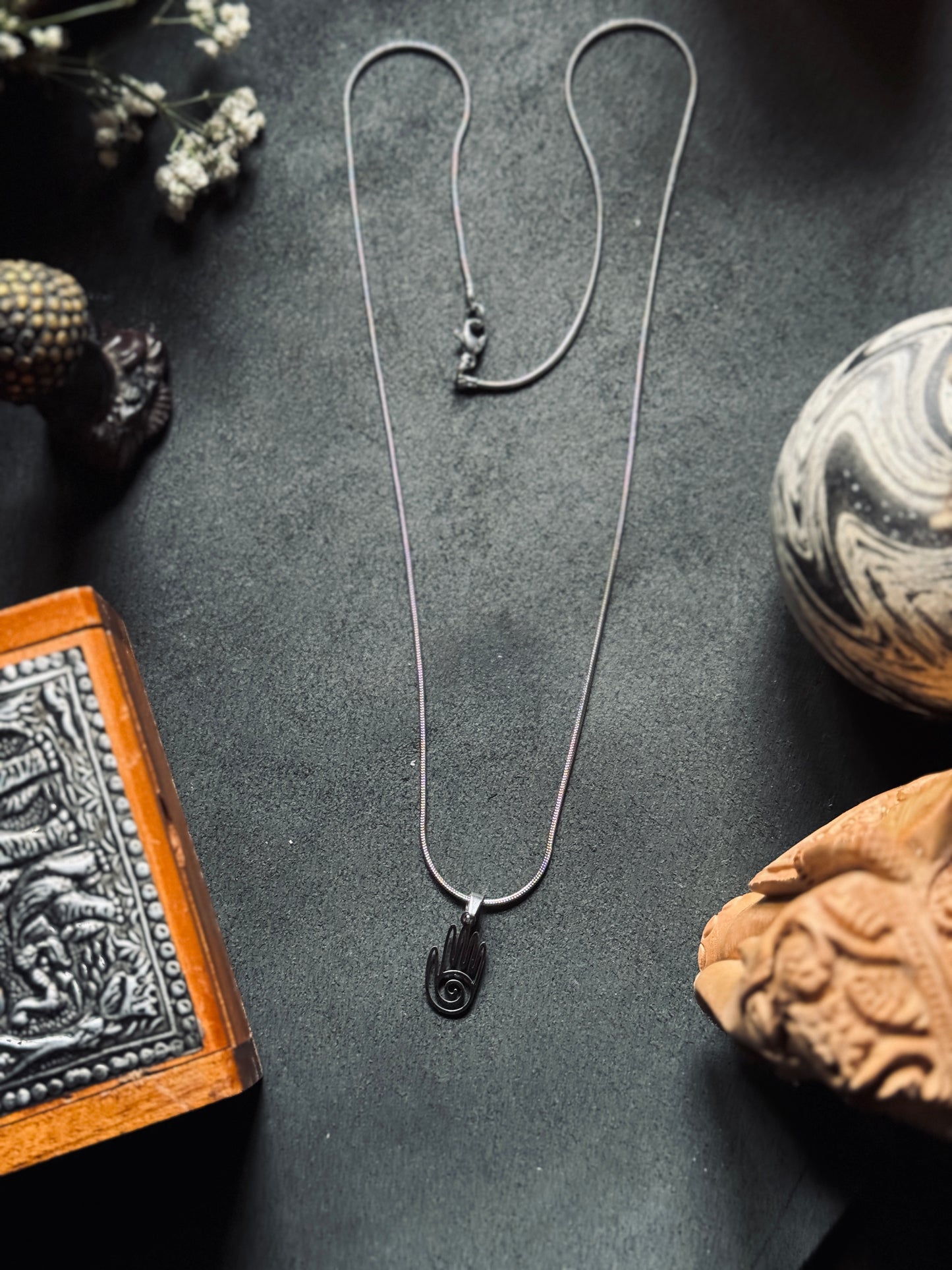 Spiral hamsa hand silver stainless steel necklace in 55 cm chain