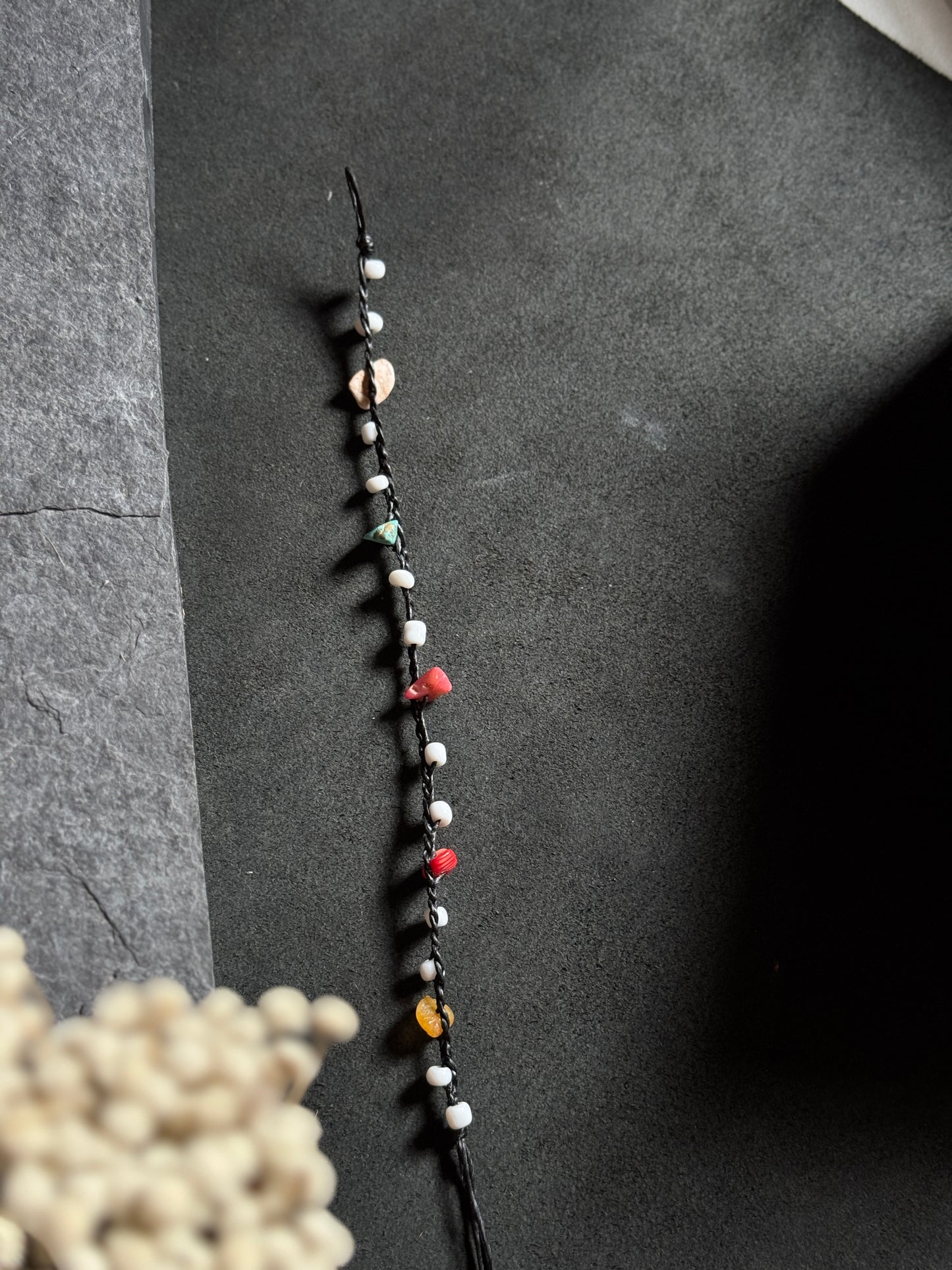 Black macramé anklet with mixed color stones