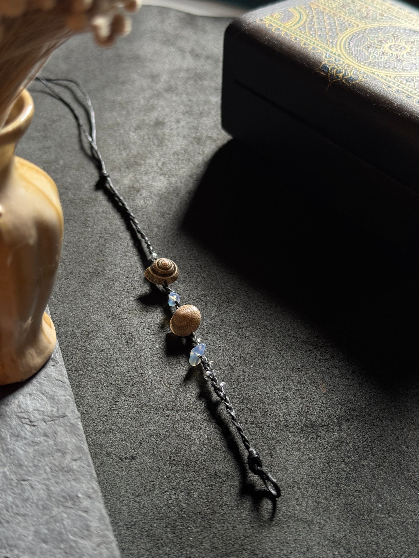 Macramé shell black anklet with white stone