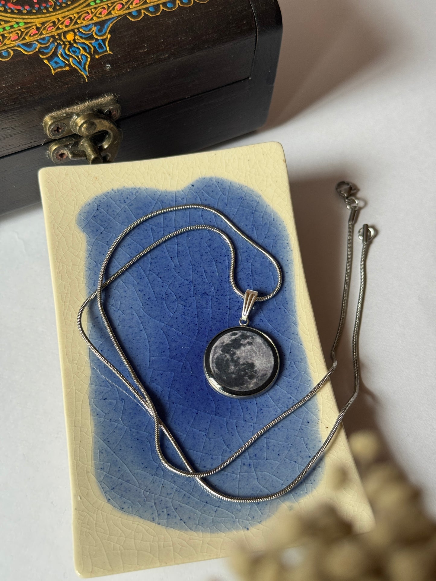Full moon resin necklace in 1.2 mm stainless steel chain 55 cm
