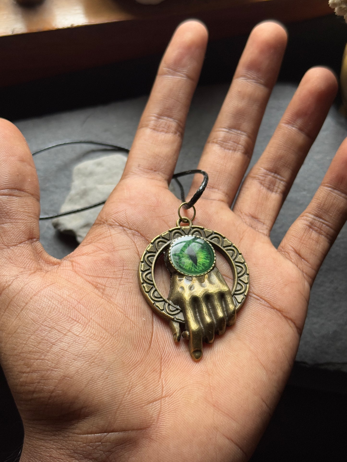 Glow in the dark antique hand eye resin necklace clearance sale pieces