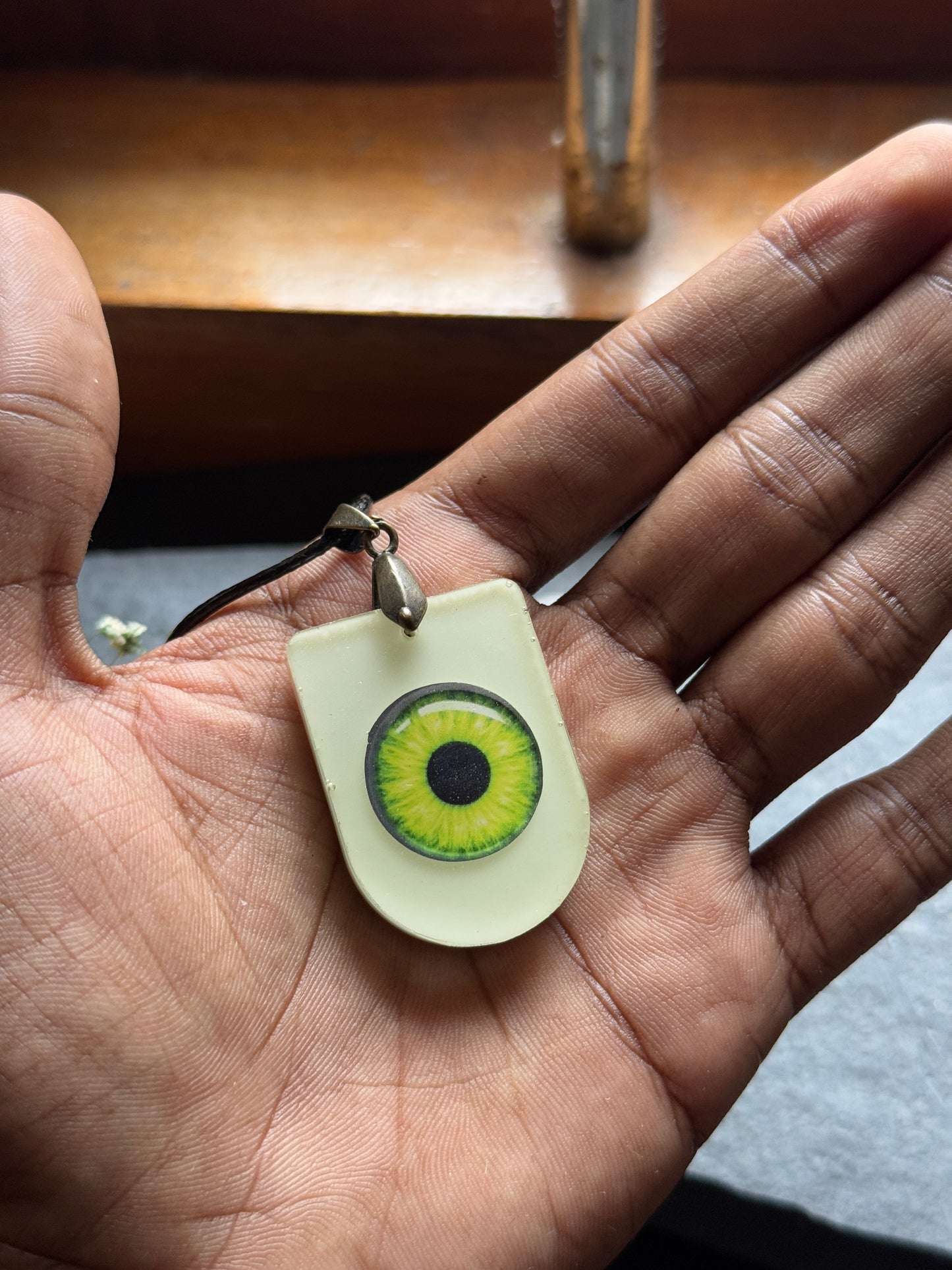 Glow in the dark light green eye resin necklace - clearance sale piece