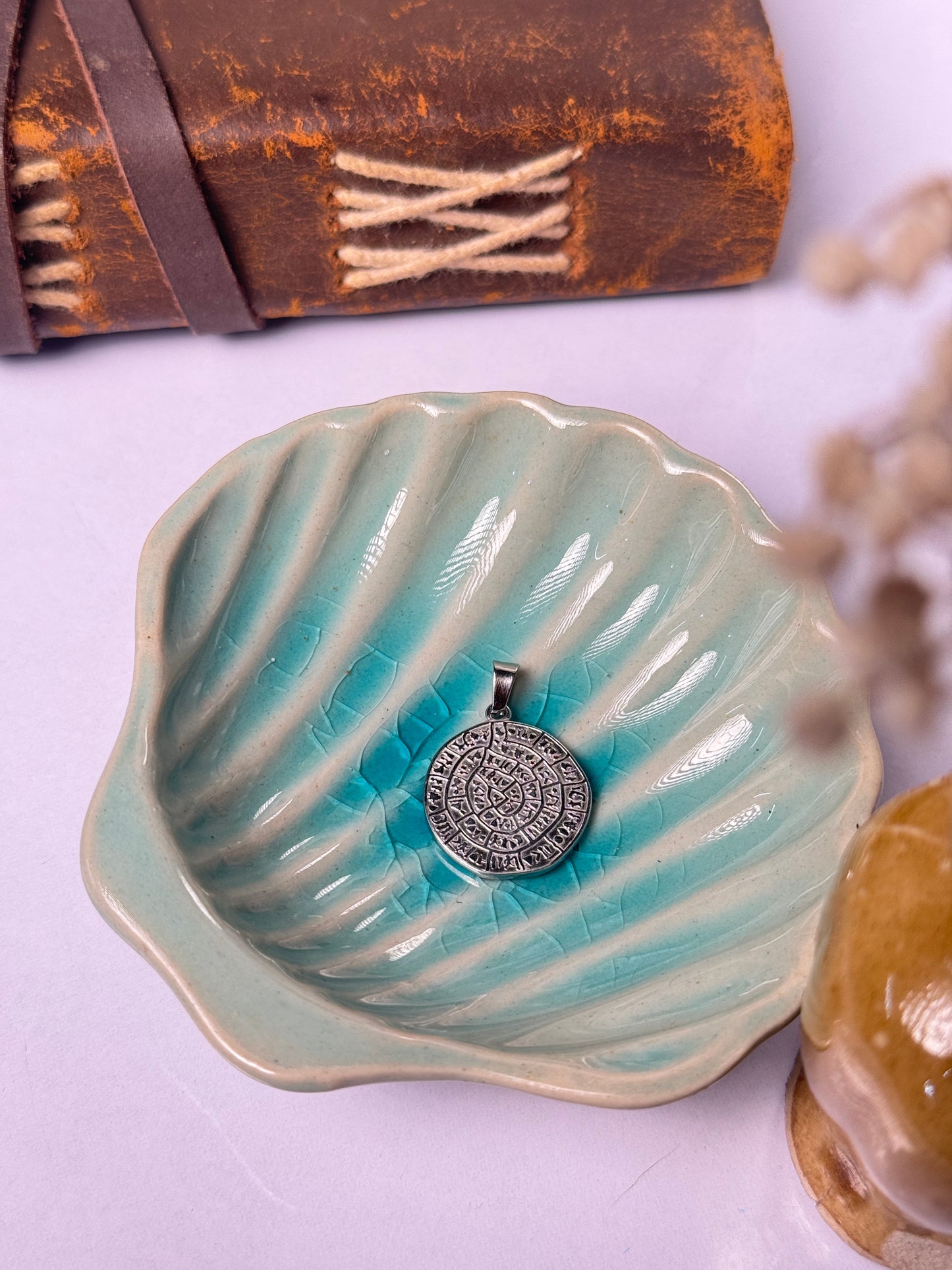 Tribal round stainless steel pendant