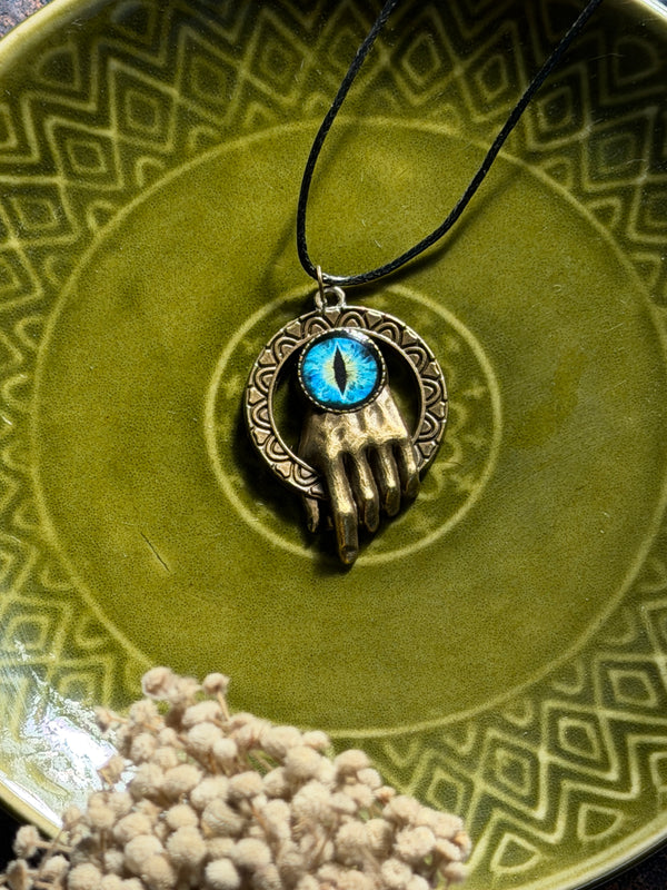 Antique hand eye resin necklace