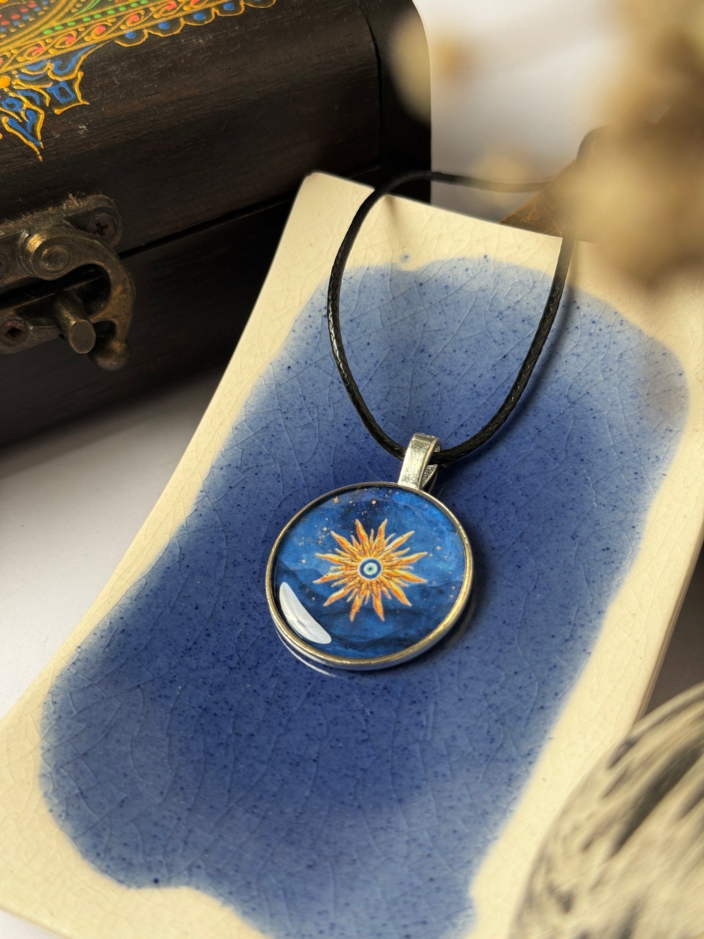 Sun evil eye resin necklace