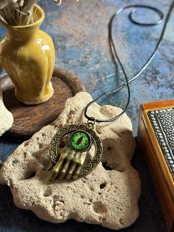 Antique hand eye resin necklace