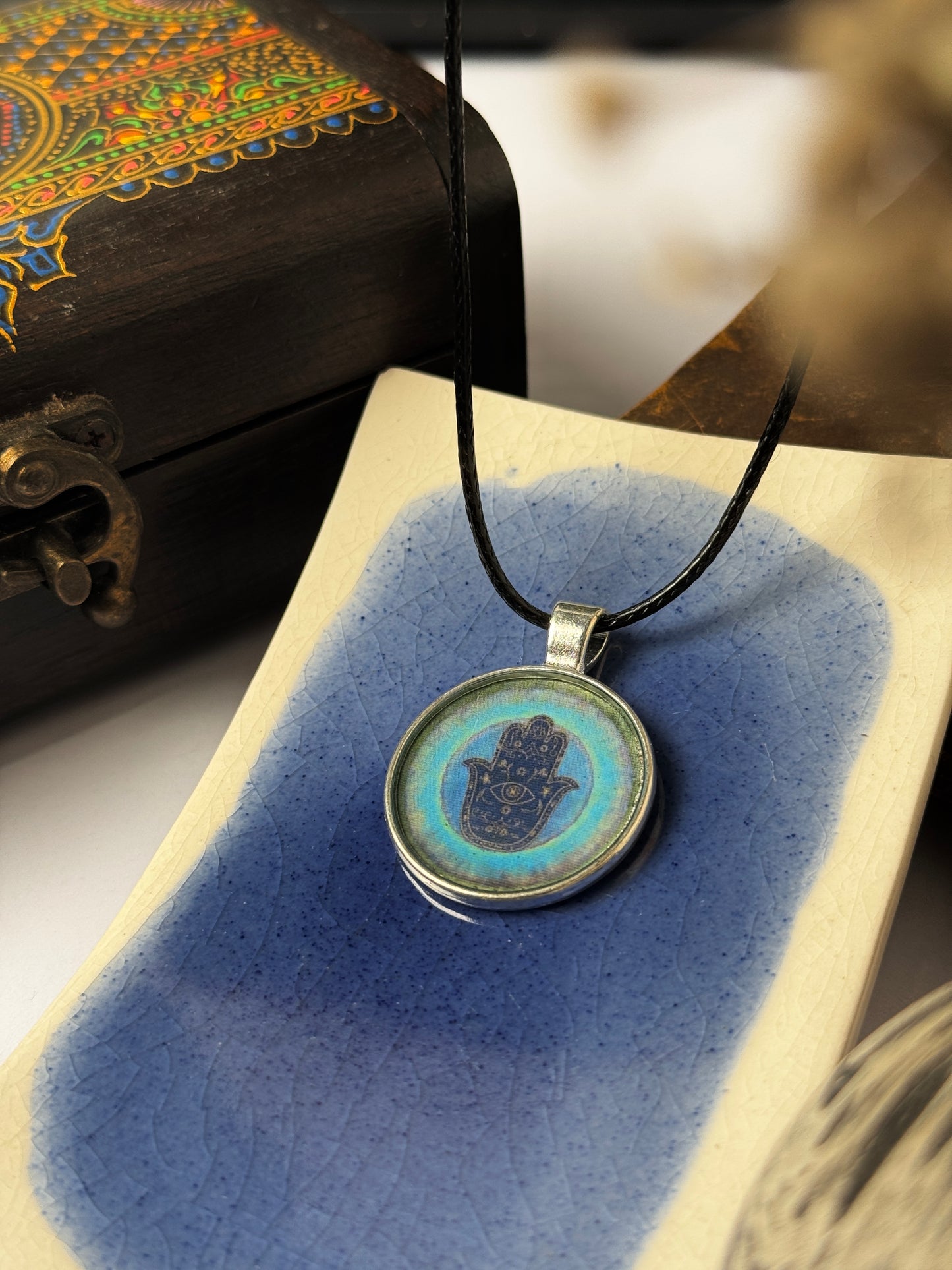 Hamsa hand purple resin necklace