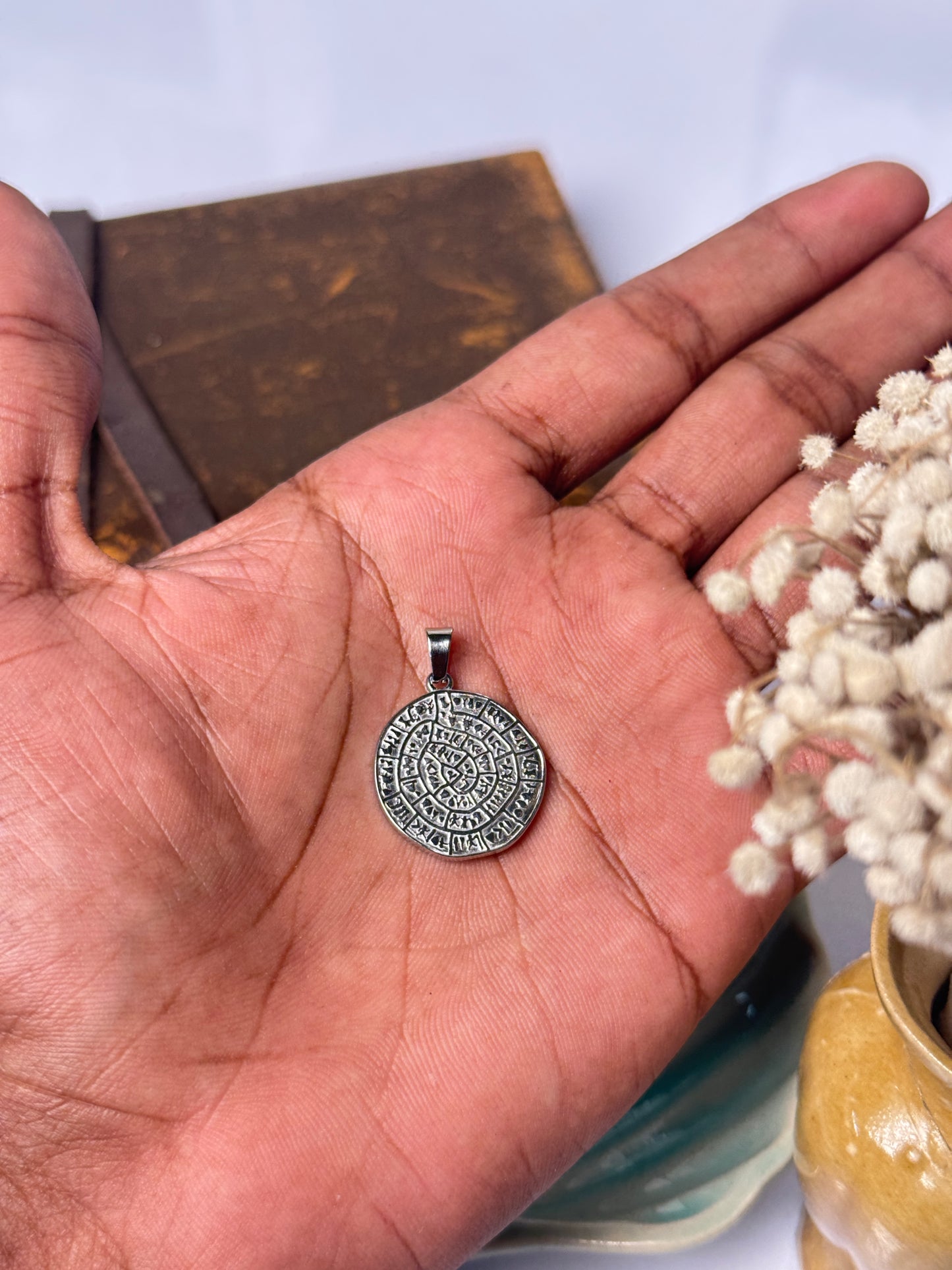 Tribal round stainless steel pendant