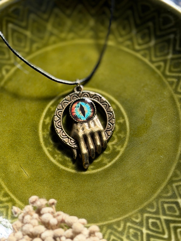 Antique hand eye resin necklace