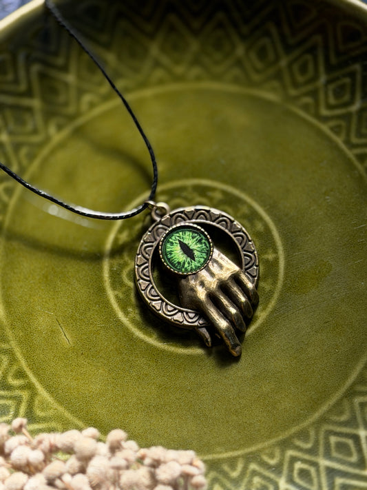 Antique hand eye resin necklace