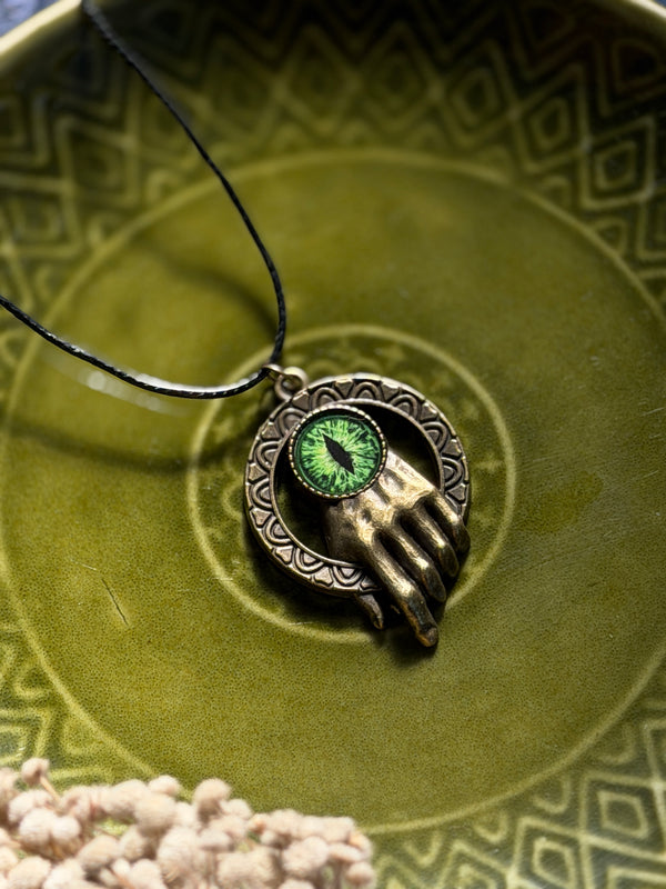Antique hand eye resin necklace