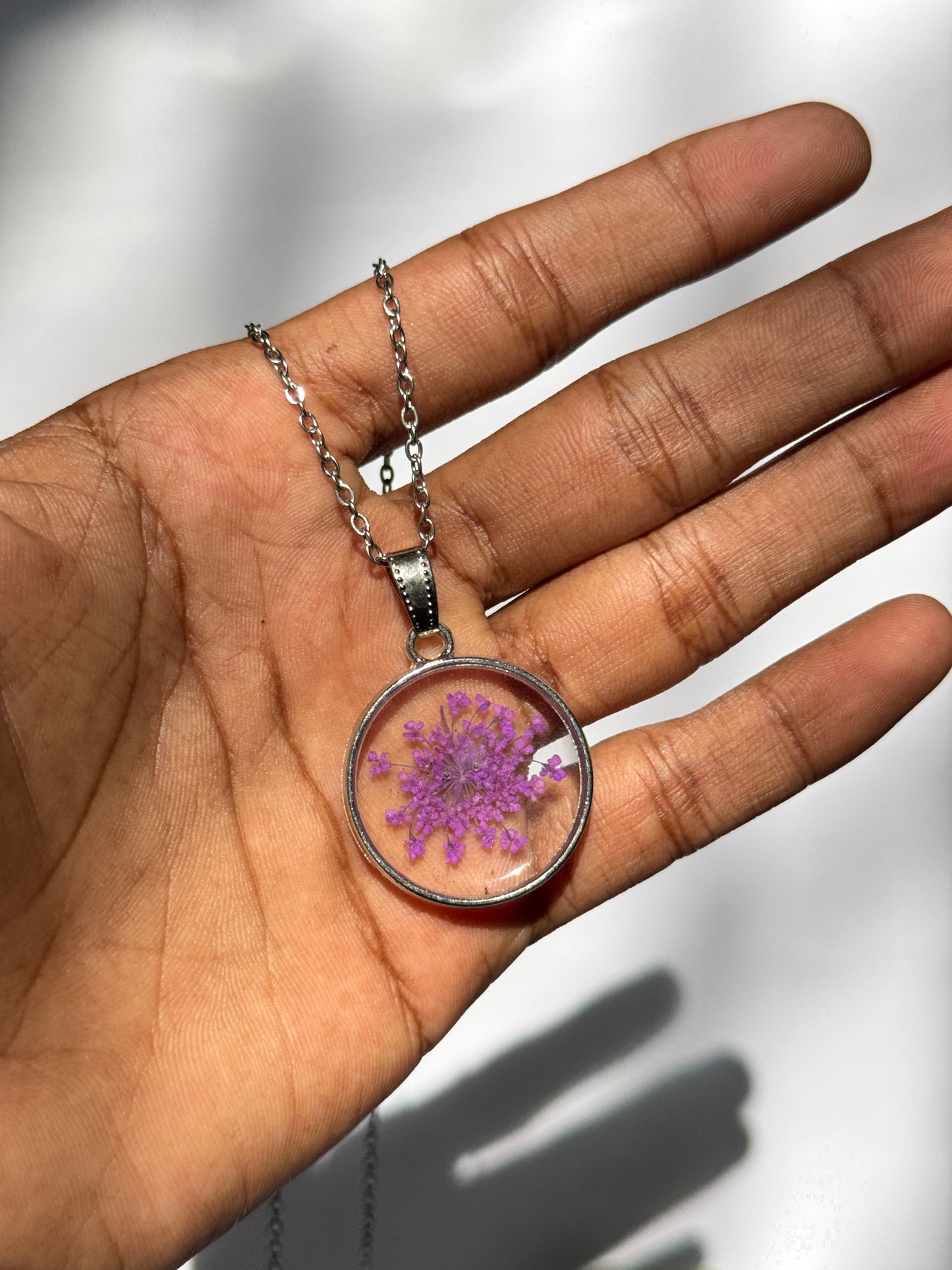 Purple queens anne's lace round stainless steel necklace