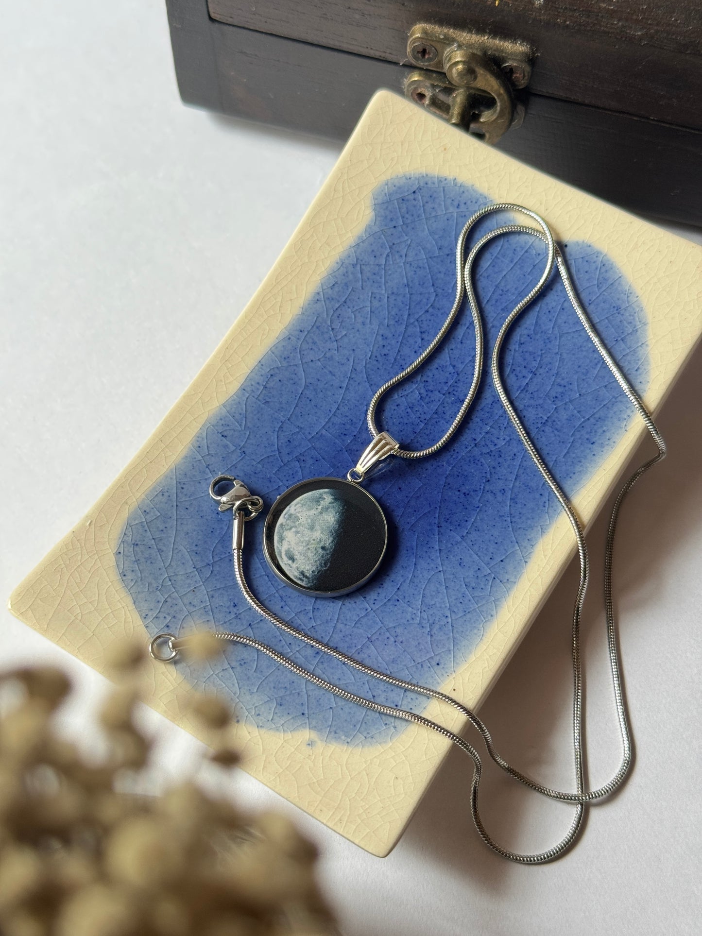 Half moon resin necklace in 1.2 mm stainless steel chain 55 cm