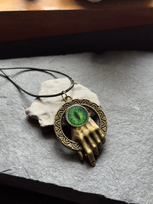 Glow in the dark antique hand eye resin necklace clearance sale pieces