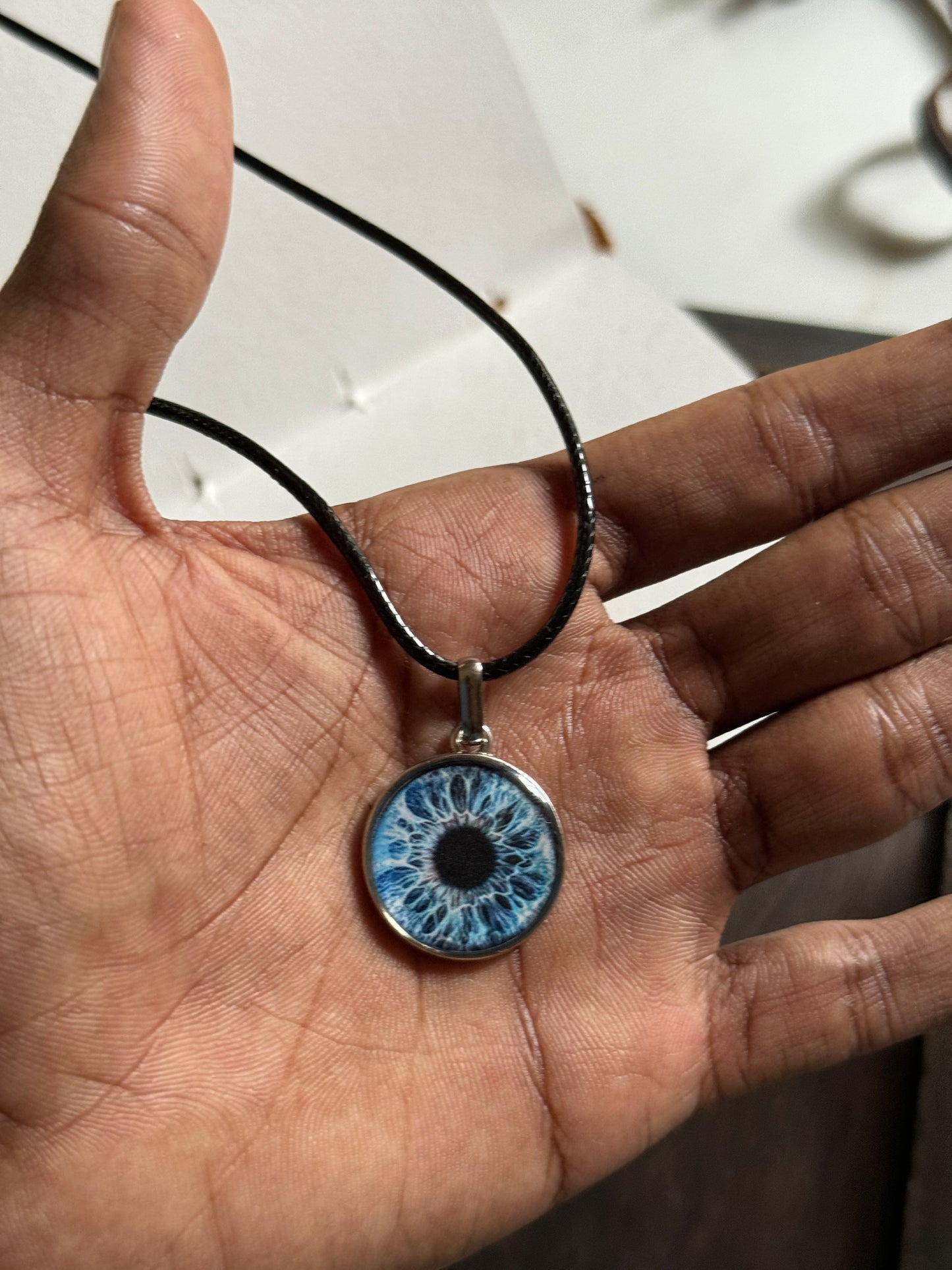 Blue eye resin necklace